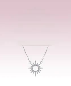 Macro shot of S925 sterling silver sunflower pendant with pavé set shimmering stones