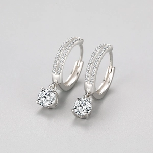 Elegant s925 sterling silver hoop earrings featuring pavé cubic zirconia and a round center stone