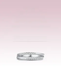 Detailed close-up of double-layered s925 silver ring with pave-set zircon stones