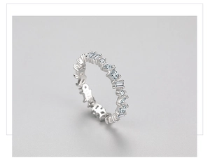Detailed close-up of S925 sterling silver ring with irregular zircon stone settings