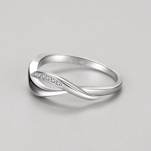 S925 sterling silver criss-cross ring with shimmering pavé cubic zirconia accents