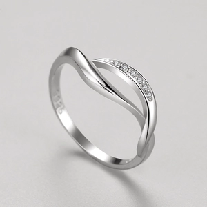 Minimalist S925 sterling silver crossed arc ring with sparkling pave cubic zirconia