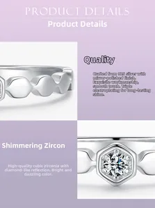 Macro detail of S925 silver honeycomb ring with micro-set cubic zirconia stones