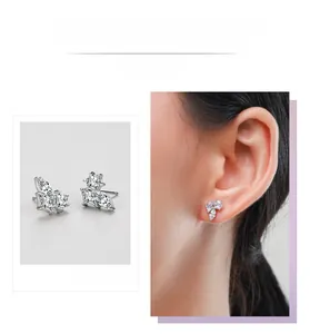 Vue détaillée de boucles d'oreilles asymétriques en argent S925 avec oxydes de zirconium