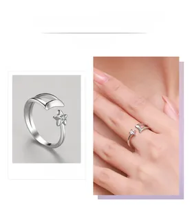 Detailed view of S925 sterling silver star and moon open ring with sparkling zircon stone