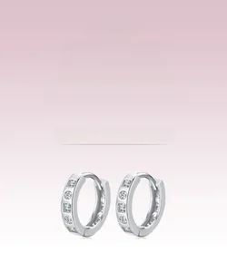 Detailed macro view of S925 sterling silver hoop earrings with micro-pave white stones