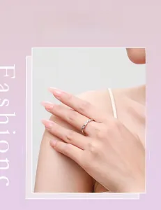 Detail of s925 silver ring featuring micro-pave cubic zirconia on a model's hand