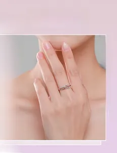 Close-up of double layer S925 silver ring featuring micro-pave cubic zirconia on finger