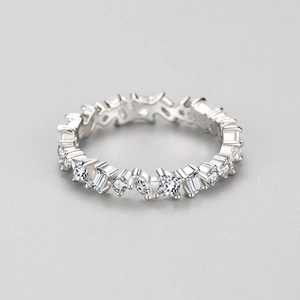 Irregular S925 sterling silver ring featuring mixed-cut cubic zirconia in a modern style