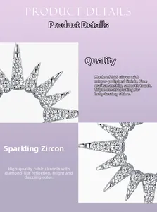 Close-up of S925 silver sunflower earrings with sparkling cubic zirconia and mirror polish
