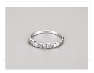 Macro shot of S925 sterling silver ring showing precise inner stamp and micro-inlaid cubic zirconia