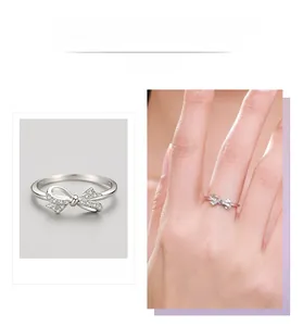 Macro detail showing a delicate S925 sterling silver bow ring with sparkling pavé zircons