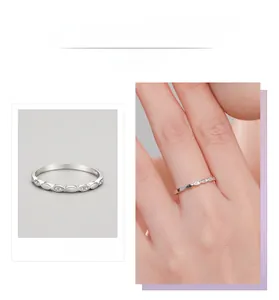 Macro detail of S925 silver geometric ring with pavé marquise-shaped zircons
