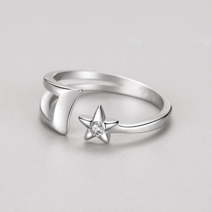 Minimalist S925 sterling silver open ring featuring polished moon and star with cubic zirconia