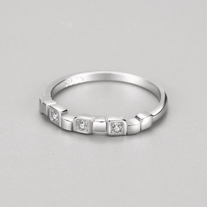 Elegant S925 sterling silver ring with three micro-pave square-set white zircon stones