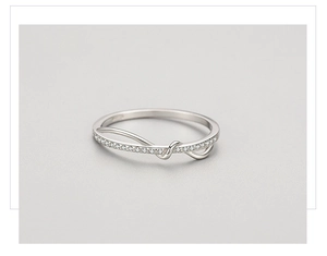 Close-up of a s925 sterling silver geometric ring with shimmering pavé set cubic zirconia
