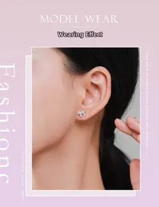 Wearing effect of s925 silver bow stud earrings with sparkling cubic zirconia on model