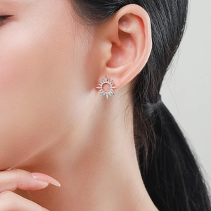 Elegant S925 sterling silver sunflower stud earrings with shiny zircon on female model
