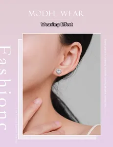 Vue détaillée de la boucle d'oreille marguerite en argent S925 avec zircons sur le modèle