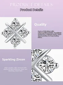 Close-up of cross stud earrings in 925 silver with sparkling cubic zirconia stones