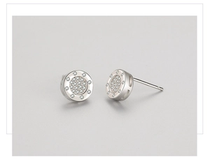 Detailed close-up of S925 silver round earrings with micro-pave cubic zirconia crystals