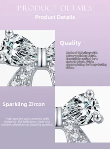 Macro shot of S925 silver bow stud earrings with polished plating and cubic zirconia