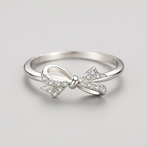 Elegant S925 sterling silver bow ring featuring micro-pave cubic zirconia accents
