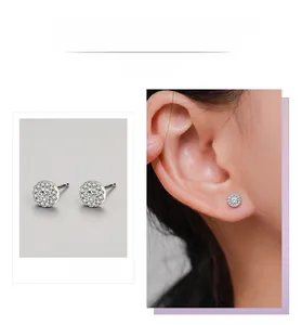 Detail view of S925 sterling silver halo stud earrings with sparkling round zirconia