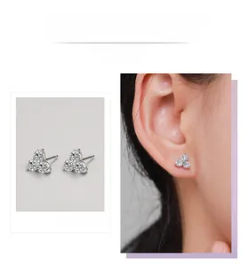 Macro shot of S925 sterling silver cluster earrings with sparkling zircon stones
