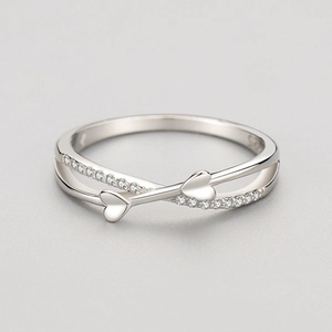 Elegant S925 sterling silver ring with crossover heart design and sparkling pavé stones