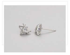 Detailed view of asymmetric S925 silver geometric earrings with sparkling zircon inlay