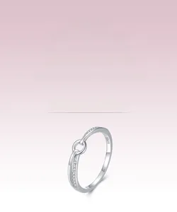 Macro shot of S925 sterling silver ring showing double-loop design and pavé cubic zirconia