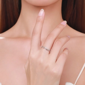 Elegant s925 silver geometric ring with micro-pave zirconia worn on a finger