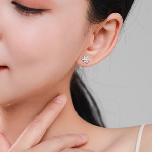 Elegant S925 sterling silver flower stud earrings with shimmering cubic zirconia stones