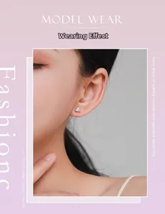 Macro view of triangular S925 silver stud earring with sparkling diamond on female ear