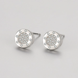 Minimalist S925 sterling silver round stud earrings featuring double halo zircon accents