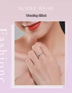 Detail of s925 silver double layer knotted ring with zircon inlay on female hand