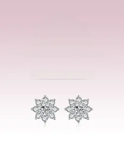 Macro shot of S925 sterling silver flower earrings with sparkling cubic zirconia stones