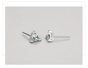 Close-up of S925 silver triangle stud earrings with sparkling clear cubic zirconia