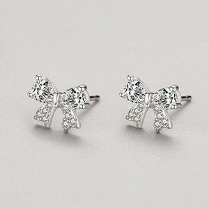 Sparkling S925 sterling silver bow stud earrings with teardrop zirconia stones