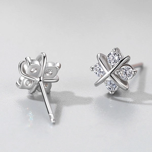 S925 sterling silver stud earrings with four round zircons in a cross metal frame