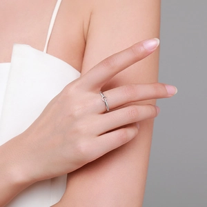 Minimalist S925 sterling silver ring with micro-pave geometric lines on model's finger
