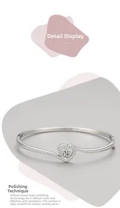 Détail macro du bracelet cœur en argent montrant les diamants et la finition polie