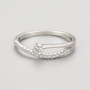 Elegant S925 sterling silver ring with interlocking pavé band and a round centerpiece