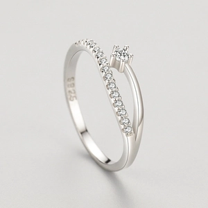 Elegant S925 sterling silver ring with micro-paved zircons and a six-prong main stone