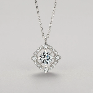 Elegant S925 silver necklace with geometric halo pendant and sparkling center stone