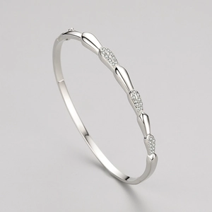 Bracelet jonc en argent S925 poli avec maillons en goutte d'eau et détails pavés brillants