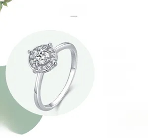Macro detail of S925 sterling silver halo ring with polished finish and shiny diamonds