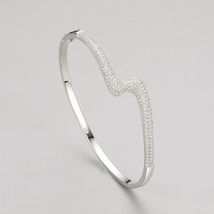 S925 sterling silver wave bracelet with pavé-set sparkling cubic zirconia stones