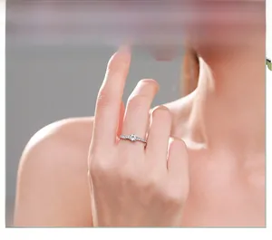 Detailed view of an s925 silver ring featuring a classic six-prong set sparkling stone